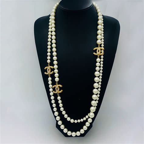 chanel classic cc pearl necklace|Chanel pearl long strand necklaces.